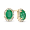 Thumbnail Image 0 of Oval Emerald and 0.088 CT. T.W. Diamond Frame Stud Earrings in 10K Gold