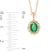 Thumbnail Image 2 of Oval Emerald and 0.05 CT. T.W. Diamond Scallop Frame Floral Drop Pendant in 10K Gold