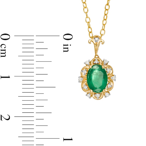 Oval Emerald and 0.05 CT. T.W. Diamond Scallop Frame Floral Drop Pendant in 10K Gold