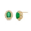 Oval Emerald and 0.07 CT. T.W. Diamond Scallop Frame Floral Stud Earrings in 10K Gold