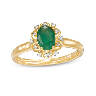 Oval Emerald and 0.04 CT. T.W. Diamond Scallop Frame Floral Ring in 10K Gold