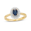 Oval Blue Sapphire and 0.19 CT. T.W. Baguette and Round Diamond Double Frame Floral Ring in 10K Gold