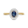 Oval Blue Sapphire and 0.19 CT. T.W. Baguette and Round Diamond Double Frame Floral Ring in 10K Gold