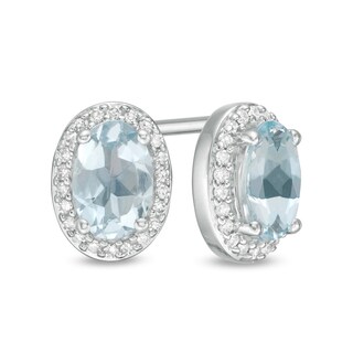 Oval Aquamarine and 0.088 CT. T.W. Diamond Frame Stud Earrings in 10K White Gold