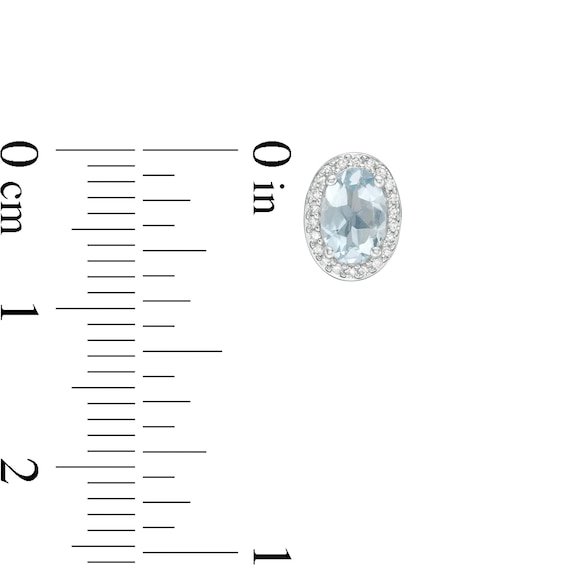 Oval Aquamarine and 0.088 CT. T.W. Diamond Frame Stud Earrings in 10K White Gold