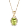 Thumbnail Image 1 of Oval Peridot and 0.08 CT. T.W. Diamond Frame Twisted Split Bail Pendant in 10K Gold