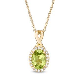 Oval Peridot and 0.08 CT. T.W. Diamond Frame Twisted Split Bail Pendant in 10K Gold