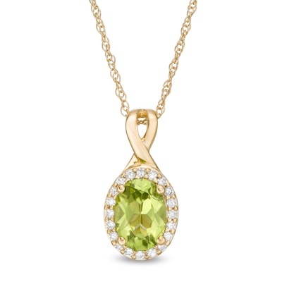 Oval Peridot and 0.08 CT. T.W. Diamond Frame Twisted Split Bail Pendant in 10K Gold