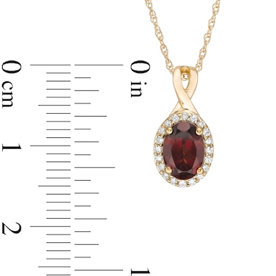 Oval Garnet and 0.08 CT. T.W. Diamond Frame Twisted Split Bail Pendant in 10K Gold