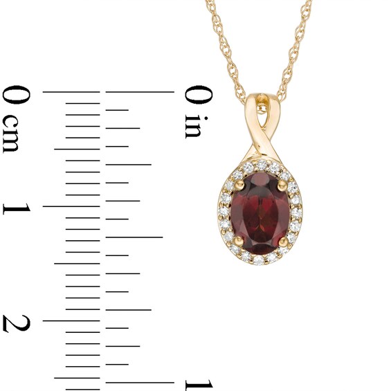 Oval Garnet and 0.08 CT. T.W. Diamond Frame Twisted Split Bail Pendant in 10K Gold