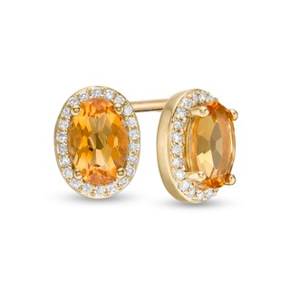 Oval Citrine and 0.088 CT. T.W. Diamond Frame Stud Earrings in 10K Gold