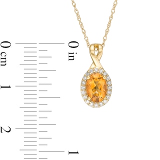 Oval Citrine and 0.08 CT. T.W. Diamond Frame Twisted Split Bail Pendant in 10K Gold