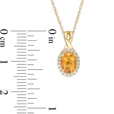 Oval Citrine and 0.08 CT. T.W. Diamond Frame Twisted Split Bail Pendant in 10K Gold