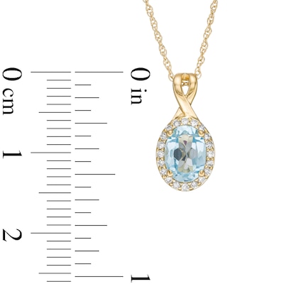 Oval Swiss Blue Topaz and 0.08 CT. T.W. Diamond Frame Twisted Split Bail Pendant in 10K Gold