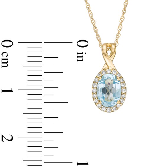 Oval Swiss Blue Topaz and 0.08 CT. T.W. Diamond Frame Twisted Split Bail Pendant in 10K Gold