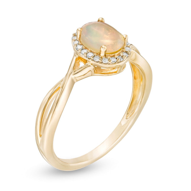 Oval Opal and 0.08 CT. T.W. Diamond Frame Twist Shank Ring in 10K Gold