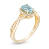 Thumbnail Image 2 of Oval Swiss Blue Topaz and 0.08 CT. T.W. Diamond Frame Twist Shank Ring in 10K Gold