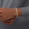 Thumbnail Image 1 of Men's 5.6mm Diamond-Cut Cuban Curb Chain Bracelet in Hollow 14K Gold - 8.5"