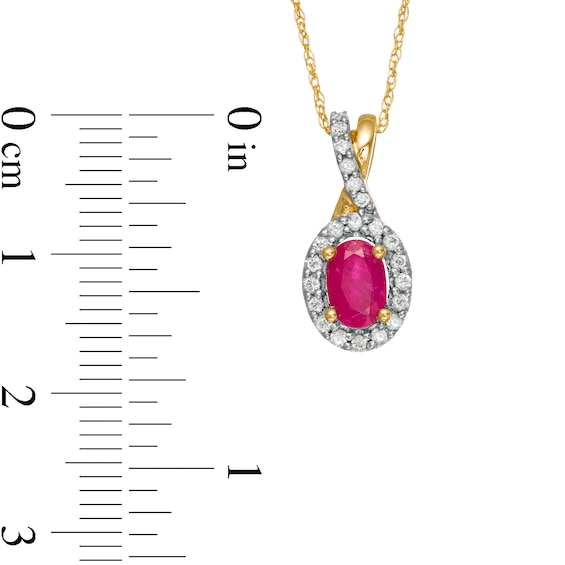 Oval Ruby and 0.15 CT. T.W. Diamond Frame Twist Drop Pendant in 10K Gold