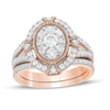 0.95 CT. T.W. Composite Oval Diamond Split Shank Vintage-Style Bridal Set in 10K Rose Gold