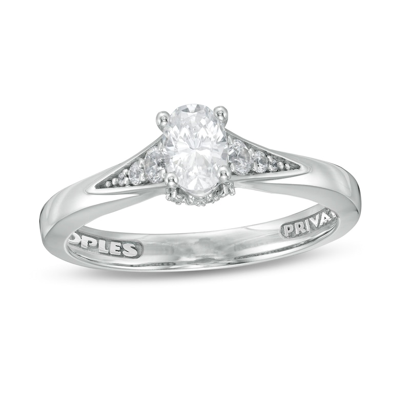 Main Image 1 of Peoples Private Collection 0.50 CT. T.W. Certified Oval Diamond Split Shank Engagement Ring in 14K White Gold (F/SI2)