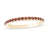 Thumbnail Image 0 of Garnet Petite Stackable Band in 10K Gold - Size 7