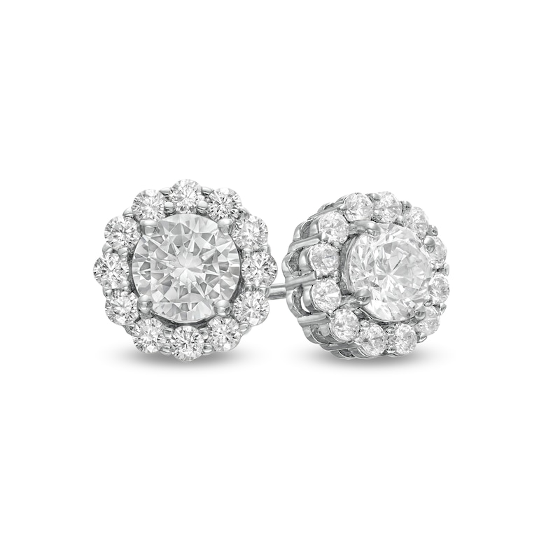 0.83 CT. T.W. Diamond Frame Flower Stud Earrings in 10K White Gold