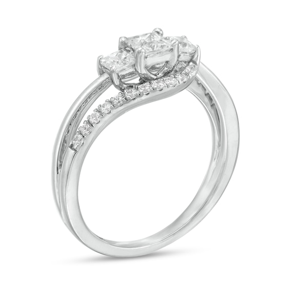 0.69 CT. T.W. Princess-Cut and Round Diamond Three Stone Bypass Ring in 10K Gold