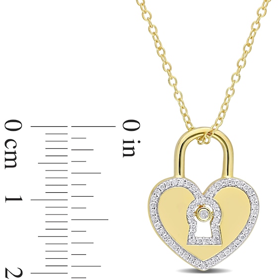 0.18 CT. T.W. Diamond Heart-Shaped Lock Pendant in Sterling Silver with Yellow Rhodium Plate