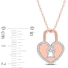 0.18 CT. T.W. Diamond Heart-Shaped Lock Pendant in Sterling Silver with Rose Rhodium Plate