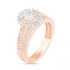 0.95 CT. T.W. Baguette and Round Diamond Sunburst Frame Bridal Set in 10K Rose Gold