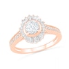 0.95 CT. T.W. Baguette and Round Diamond Sunburst Frame Bridal Set in 10K Rose Gold