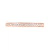 0.95 CT. T.W. Baguette and Round Diamond Sunburst Frame Bridal Set in 10K Rose Gold