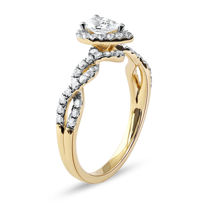 0.75 CT. T.W. Pear-Shaped Diamond Frame Twist Shank Engagement Ring in 10K Gold (I/I1)|Peoples Jewellers