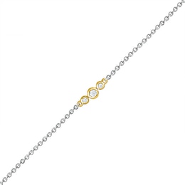 0.065 CT. T.W. Diamond Circle Trio Anklet in Sterling Silver and 10K Gold – 10&quot;