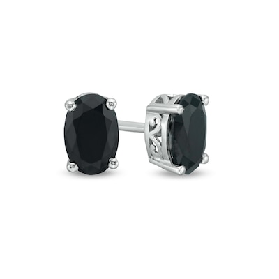 0.95 CT. T.W. Oval Black Enhanced Diamond Solitaire Stud Earrings in 10K Gold