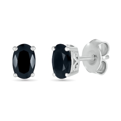 0.95 CT. T.W. Oval Black Enhanced Diamond Solitaire Stud Earrings in 10K Gold