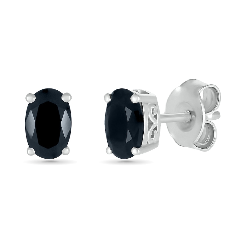0.95 CT. T.W. Oval Black Enhanced Diamond Solitaire Stud Earrings in 10K Gold|Peoples Jewellers