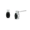 Thumbnail Image 0 of 0.95 CT. T.W. Oval Black Enhanced and White Diamond Stud Earrings in 10K White Gold