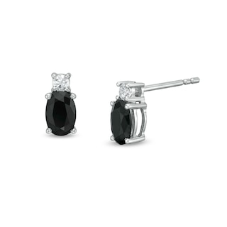 0.95 CT. T.W. Oval Black Enhanced and White Diamond Stud Earrings in 10K White Gold