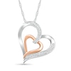 Thumbnail Image 0 of 0.085 CT. T.W. Diamond Tilted Double Heart Pendant in Sterling Silver and 10K Rose Gold