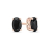 0.95 CT. T.W. Oval Black Enhanced Diamond Solitaire Stud Earrings in 10K Rose Gold