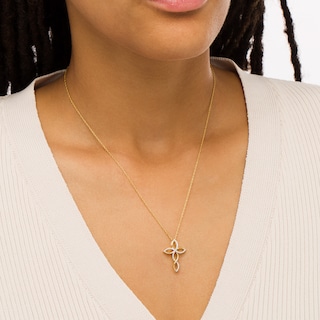 0.145 CT. T.W. Diamond Twist Cross Pendant in 10K Gold