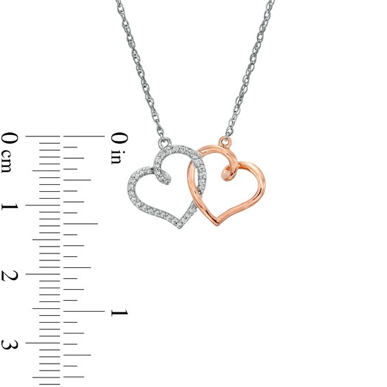 0.085 CT. T.W. Diamond Interlocking Heart Necklace in Sterling Silver and 10K Rose Gold