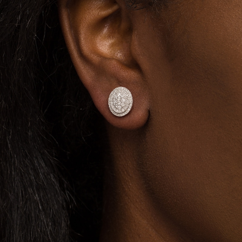 0.69 CT. T.W. Composite Oval Diamond Frame Stud Earrings in 10K White Gold