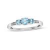 Thumbnail Image 0 of Swiss Blue Topaz and Diamond Accent Three Stone Ring in 10K White Gold