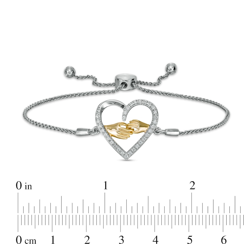 0.147 CT. T.W. Diamond Heart Bolo Bracelet in Sterling Silver and 10K Gold – 9.5"