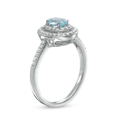 Oval Aquamarine and 0.23 CT. T.W. Diamond Double Frame Ring in 10K White Gold