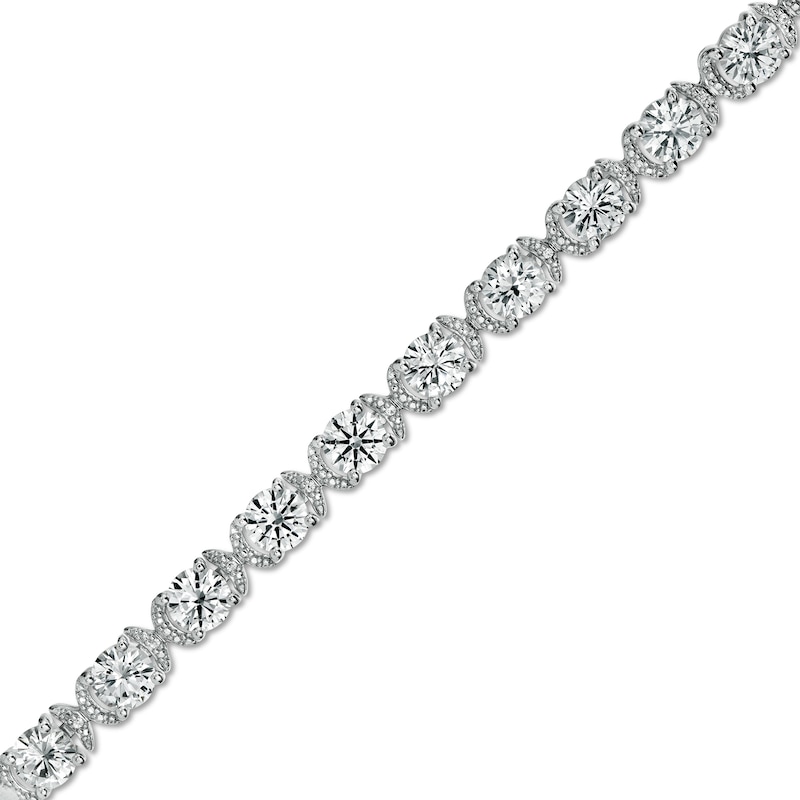 5.0mm White Lab-Created Sapphire and 0.04 CT. T.W. Diamond Oval Frame Line Bracelet in Sterling Silver - 7.5"