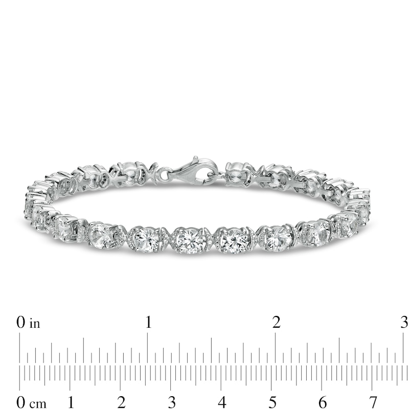 5.0mm White Lab-Created Sapphire and 0.04 CT. T.W. Diamond Oval Frame Line Bracelet in Sterling Silver - 7.5"|Peoples Jewellers